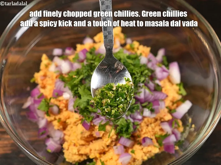Step 14 – Add 1 tsp finely <a href="https://www.tarladalal.com/glossary-chopped-green-chilli-820i">chopped green chillies</a>.&nbsp;Green chillies add a spicy kick and a …