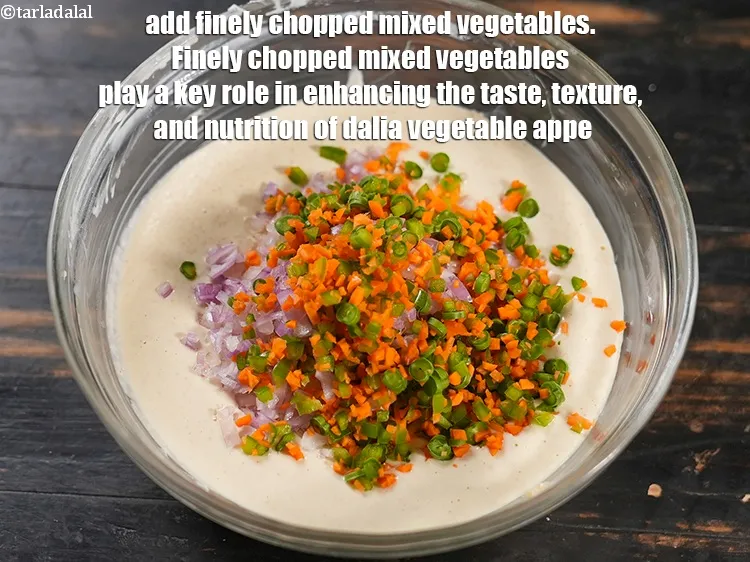 Step 15 – Add &frac14; cup finely&nbsp;<a href="https://www.tarladalal.com/glossary-chopped-mixed-vegetables-782i">chopped mixed vegetables</a>. Finely chopped mixed vegetables play a key role …