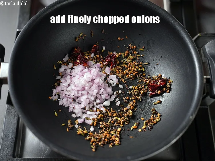 Step 19 – Add &frac14; cup finely <a href="https://www.tarladalal.com/glossary-chopped-onions-722i">chopped onions</a>.
