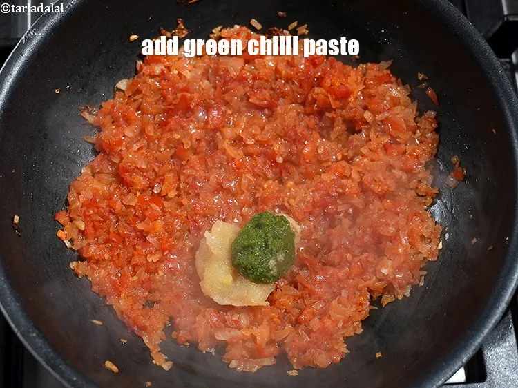 Step 14 – Add 1 tsp <a href="https://www.tarladalal.com/glossary-green-chilli-paste-hari-mirch-ki-paste-mirchi-paste-333i">green chilli paste</a>.&nbsp;