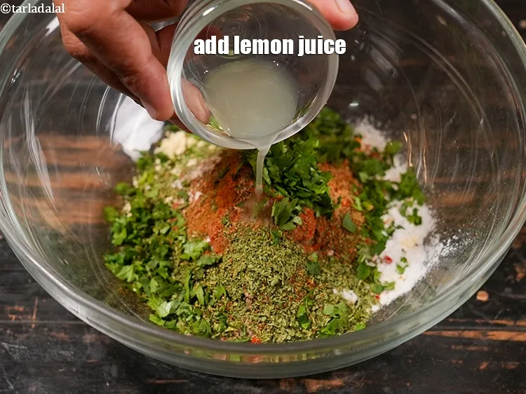 Step 14 – Add 1 tsp <a href="https://www.tarladalal.com/glossary-lemon-juice-numbi-ka-ras-nimbu-ka-juice-471i">lemon juice</a>.