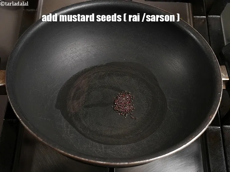 Step 15 – Add 1/4 tsp&nbsp;<a href="https://www.tarladalal.com/glossary-mustard-seeds-sarson-rai-sarson-ke-beej-525i">mustard seeds ( rai / sarson)</a>.