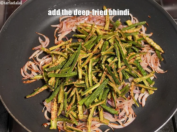 Step 14 – Add the deep-fried bhindi.&nbsp;
