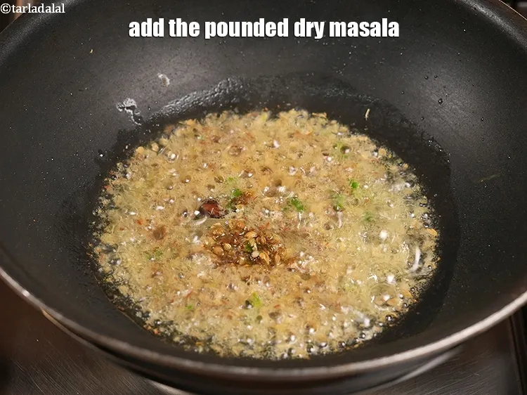 Step 14 – Add the pounded dry masala.