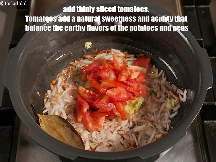 Step 14 – Add &frac14; cup thinly <a href="https://www.tarladalal.com/glossary-sliced-tomatoes-746i">sliced tomatoes</a>.&nbsp;Tomatoes add a natural sweetness and acidity that balance …