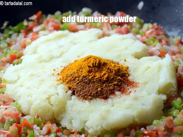 Step 15 – Add &frac12; tsp <a href="https://www.tarladalal.com/glossary-turmeric-powder-haldi-645i">turmeric powder (haldi)</a>.