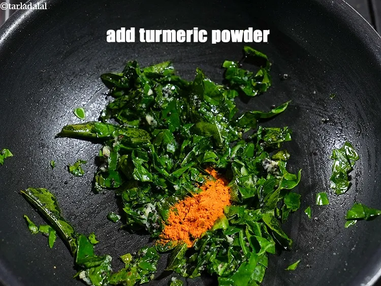 Step 14 – Add &frac12; tsp <a href="https://www.tarladalal.com/glossary-turmeric-powder-haldi-645i">turmeric powder (haldi)</a>.