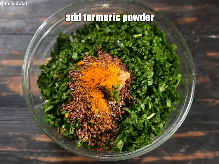 Step 14 – Add &frac12; tsp <a href="https://www.tarladalal.com/glossary-turmeric-powder-haldi-645i">turmeric powder (haldi)</a>.&nbsp;