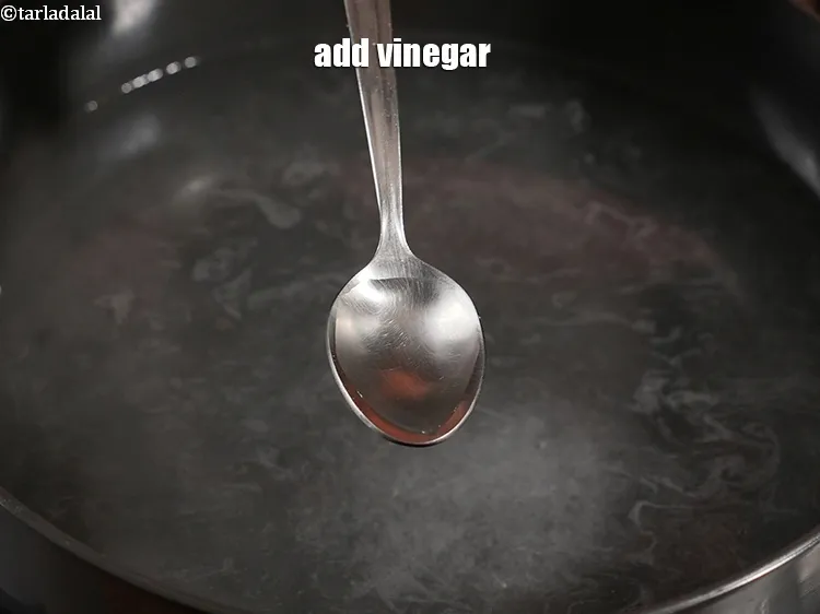 Step 14 – Add 1 tsp <a href="https://www.tarladalal.com/glossary-vinegar-sirka-cooking-vinegar-341i">vinegar</a>.