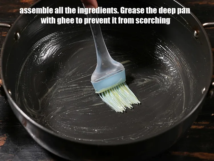 Step 30 – Grease the deep pan with ghee to prevent it from scorching.