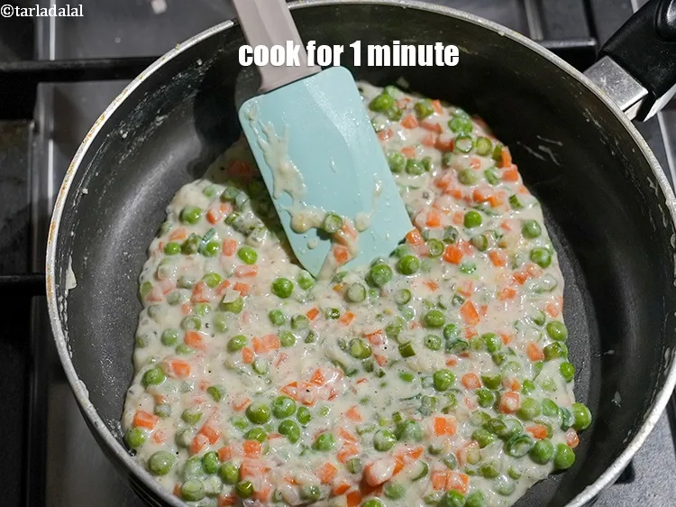 Step 20 – Mix well and cook on a medium flame for 1 minute, while stirring occasionally. Keep …