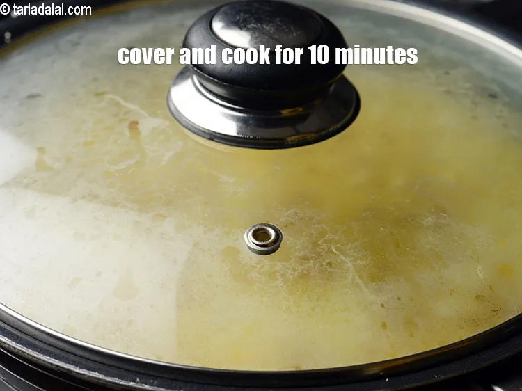 Step 14 – Cover with a lid and cook on a slow flame for about 10 minutes, while …