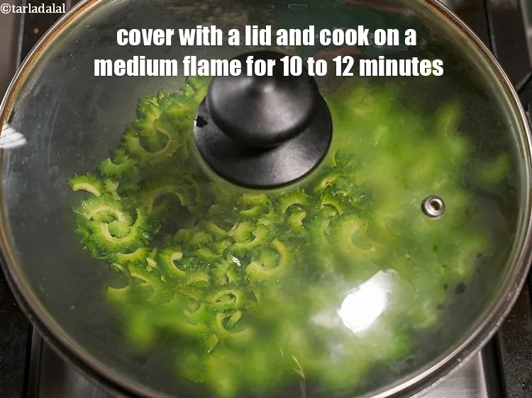 Step 14 – Cover with a lid and cook on a medium flame for 10 to 12 minutes.