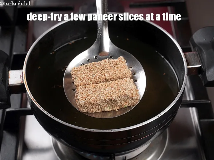 Step 14 – Heat the oil in a deep non-stick kadhai and deep-fry, a few paneer slices at …
