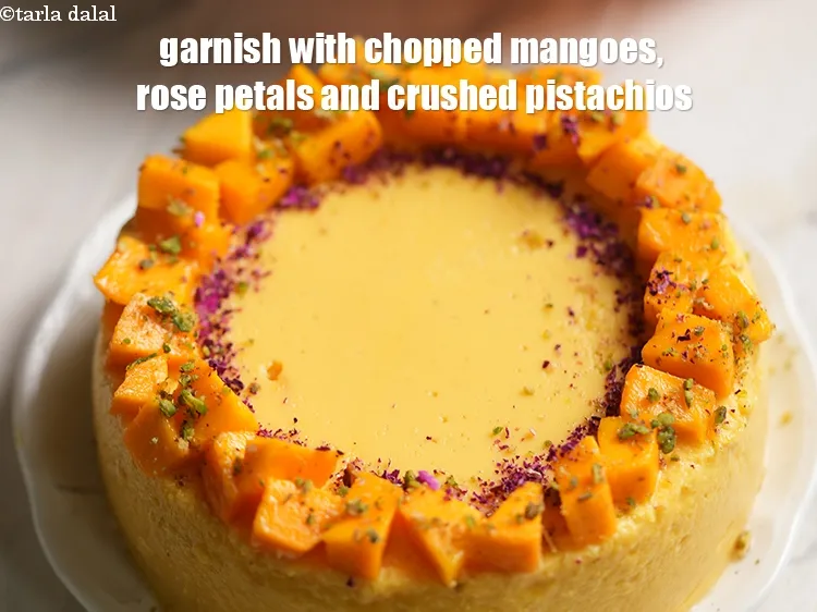 Step 14 – Garnish with chopped mangoes, rose petals and crushed pistachios.