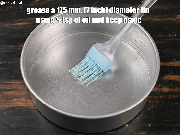 Step 22 – <meta charset="UTF-8" /> Grease a 175 mm. (7 inch) diameter tin using &frac12; tsp of …