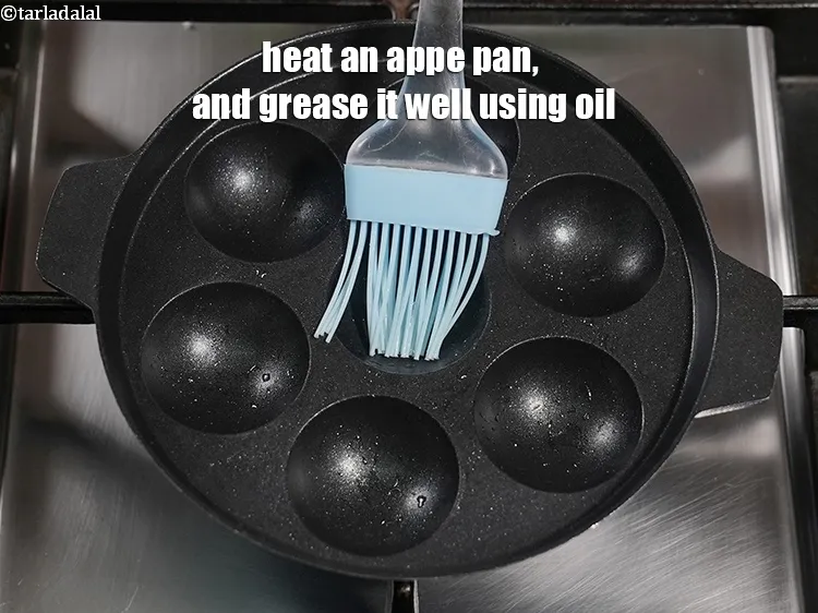 Step 14 – Heat an appe pan, and grease it well using &frac12; tsp oil.