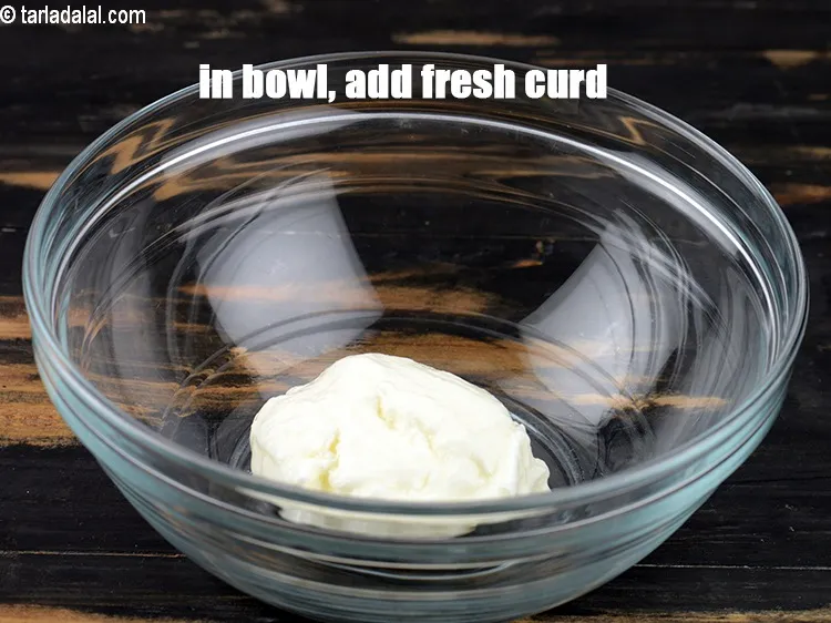 Step 15 – For <strong>butter milk rasam</strong>, in a bowl, add 1/4 cup fresh curd.