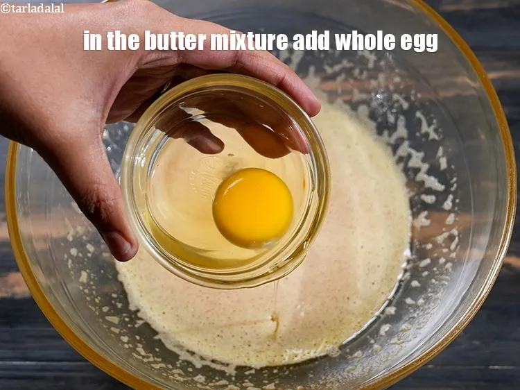Step 14 – In the butter mixture bowl, add 1 whole egg.