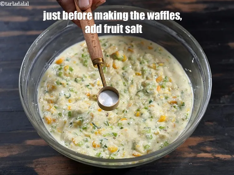 Step 14 – Just before making the waffles, add &frac12; tsp <a href="https://www.tarladalal.com/glossary-fruit-salt-420i">fruit salt</a>.