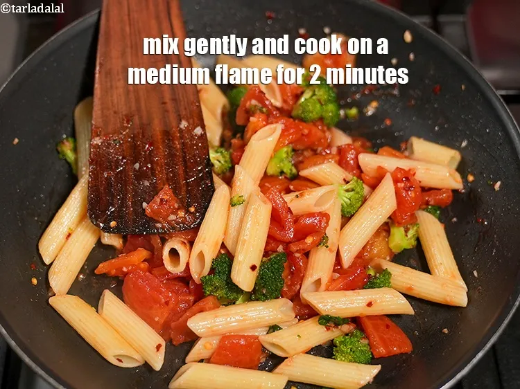 Step 14 – Mix gently and cook on a medium flame for 2 minutes, while stirring occasionally.