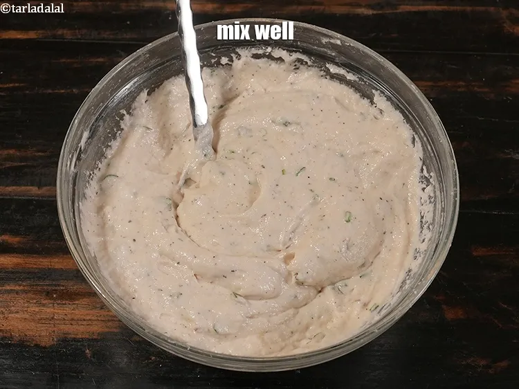 स्टेप 13 – अच्छी तरह से मिलाएं और हमारा <strong>बोंडा | उड़द दाल …