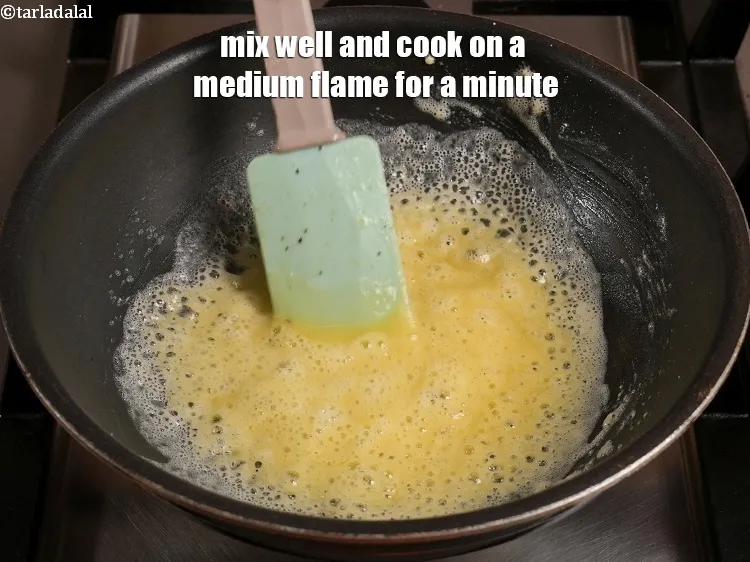 Step 14 – Mix well and cook on a medium flame for a minute.