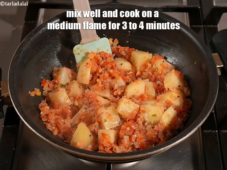 Step 14 – Mix well and cook on a medium flame for 3 to 4 minutes.