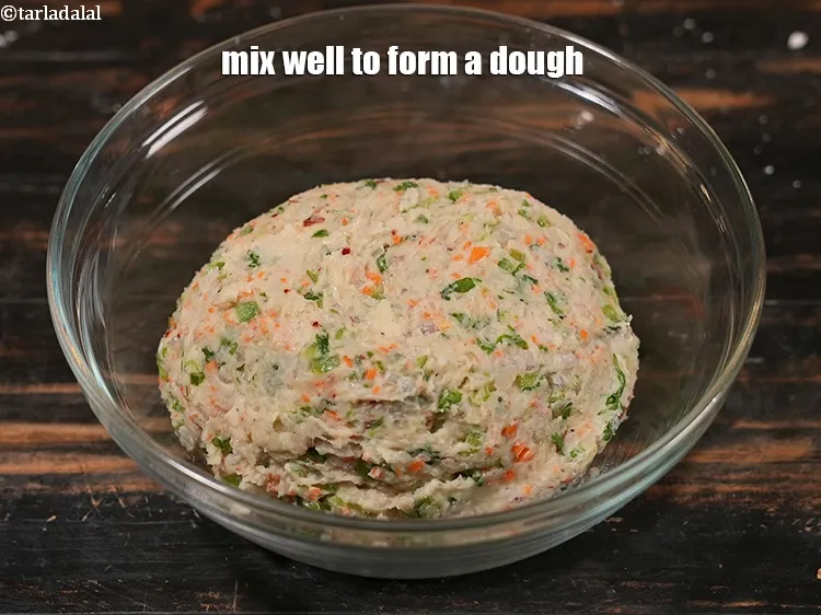 Step 14 – Mix well to form a dough.