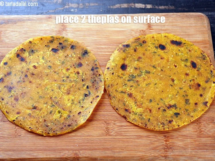 Step 14 – Place 2 theplas on a clean, dry surface.&nbsp;