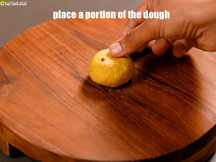 Step 14 – Place a portion of the dough.