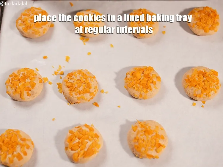 Step 14 – Place the cookies in a lined baking tray at regular intervals.