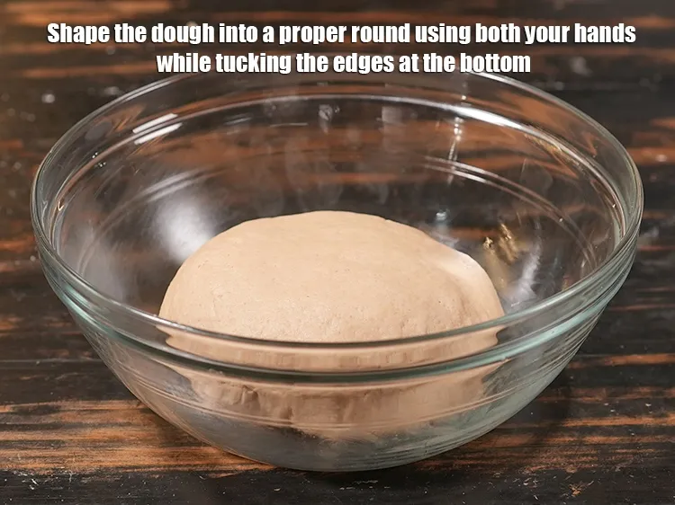Step 18 – Shape the dough into a proper round using both your hands while tucking the edges …