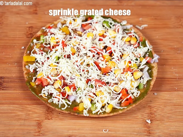Step 14 – Finally sprinkle 2 tbps grated cheese.