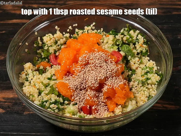 Step 26 – Top with&nbsp;<meta charset="UTF-8" />1 tbsp&nbsp;<a href="glossary-roasted-sesame-seeds-2271i">roasted sesame seeds (til)</a>.