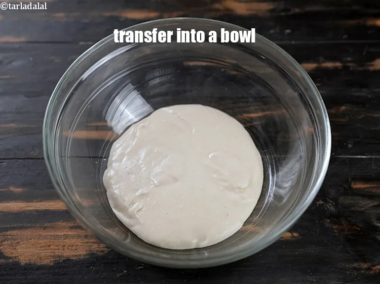 Step 14 – Transfer the urad dal paste in a deep bowl.