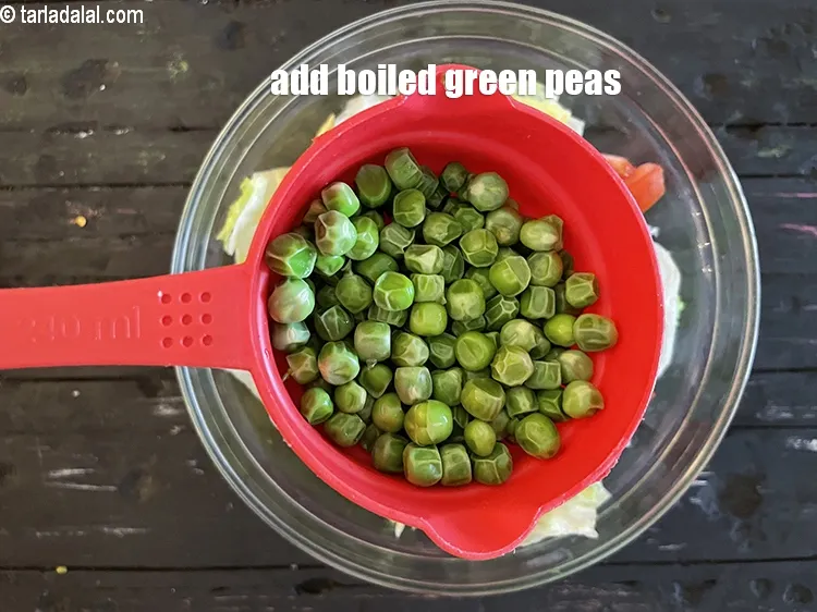 Step 14 – Add 1/2&nbsp;&nbsp;cup&nbsp;<a href="glossary-boiled-green-peas-1078i">boiled green peas</a>.