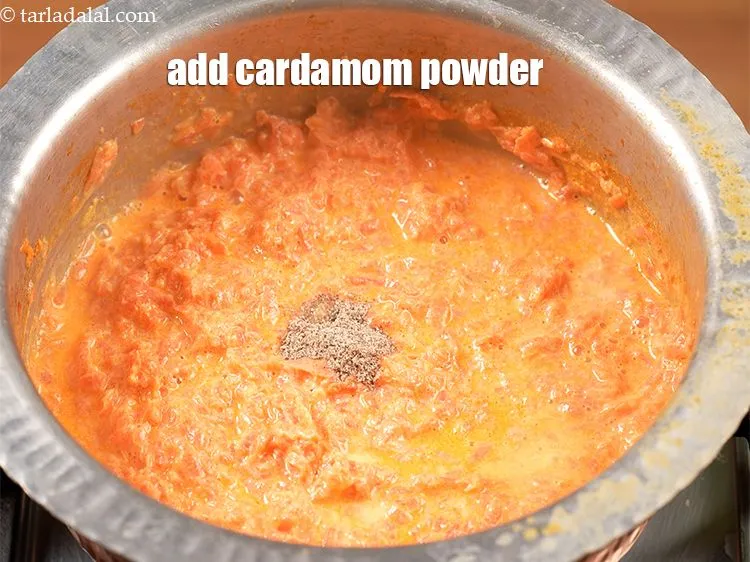 Step 14 – Add &frac12; tsp <a href="https://www.tarladalal.com/glossary-cardamom-powder-elaichi-powder-265i">cardamom (elaichi) powder</a>.