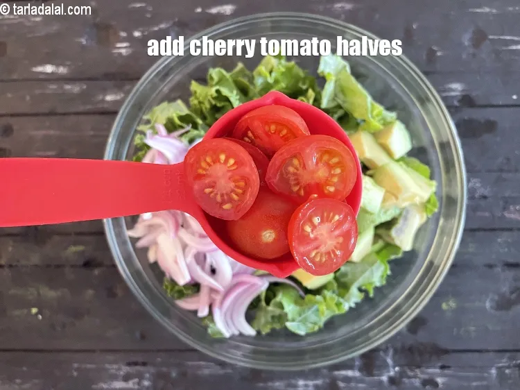 Step 15 – Add 1/4 cup cheery tomatoe halves.