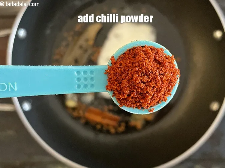Step 14 – Add&nbsp;<meta charset="UTF-8" />1/2 tsp&nbsp;<a href="glossary-chilli-powder-red-chilli-powder-339i">chilli powder</a>.