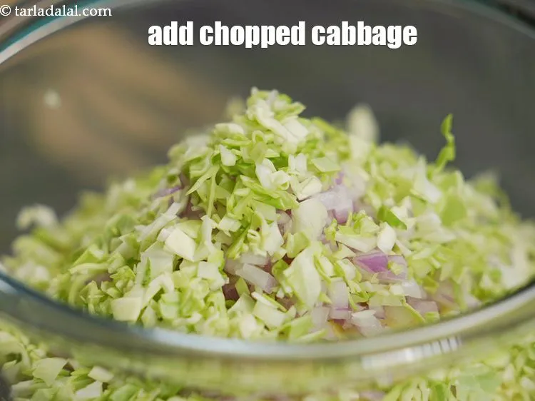 Step 14 – Add 1/4 cup&nbsp;finely&nbsp;<a href="https://www.tarladalal.com/glossary-chopped-cabbage-781i">chopped cabbage</a>. Make sure it is finely chopped.&nbsp;