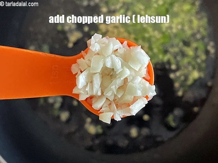 Step 27 – Add&nbsp;<meta charset="UTF-8" />1 tsp&nbsp;<a href="glossary-chopped-garlic-790i">chopped garlic (lehsun)</a>.
