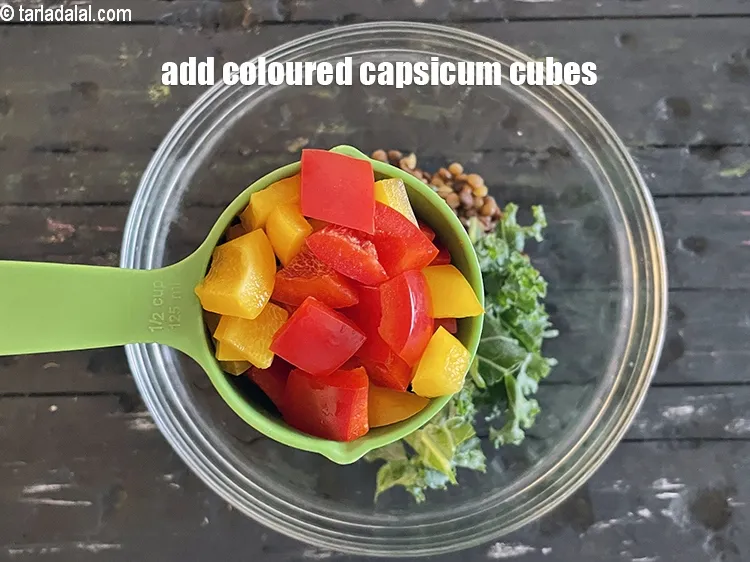 Step 27 – Add&nbsp;<meta charset="UTF-8" />1/2 cup&nbsp;coloured&nbsp;<a href="glossary-capsicum-cubes-170i">capsicum cubes</a>.