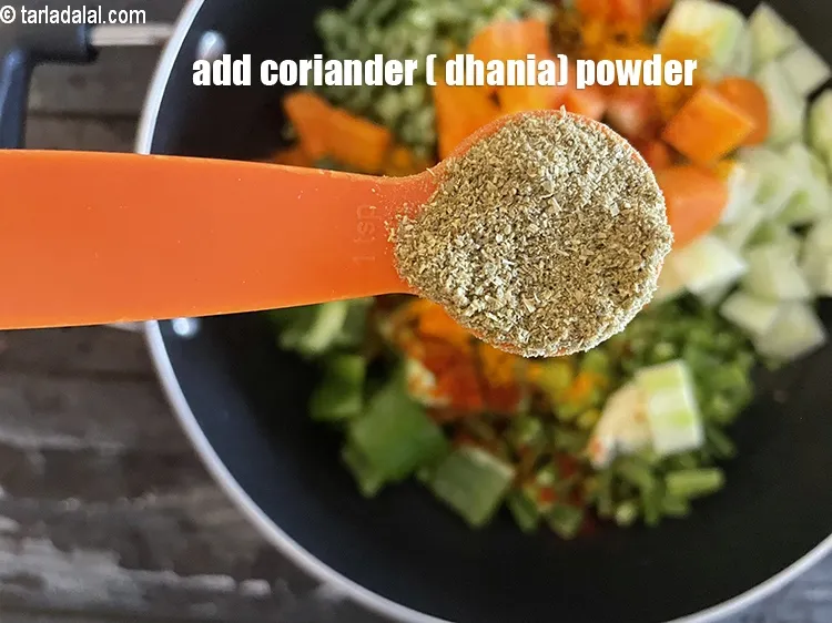Step 24 – Add&nbsp;<meta charset="UTF-8" />1 tsp&nbsp;<a href="glossary-coriander-powder-dhania-powder-370i">coriander (dhania) powder</a>.