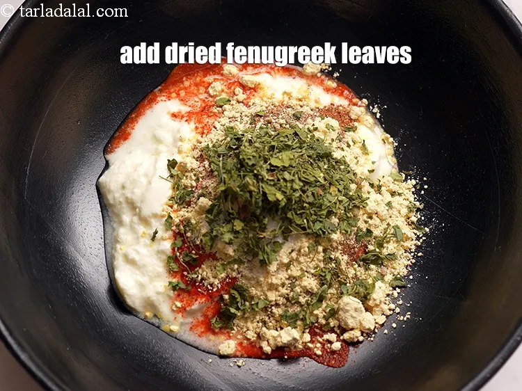 Step 14 – Add 1 tbsp <a href="https://www.tarladalal.com/glossary-dried-fenugreek-leaves-kasuri-methi-374i">dried fenugreek leaves (kasuri methi)</a>.