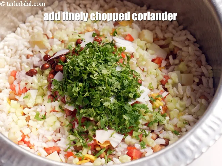Step 15 – Add 3 tbsp cup finely <a href="https://www.tarladalal.com/glossary-chopped-coriander-783i">chopped coriander (dhania)</a>.