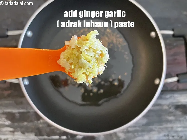 Step 25 – Add&nbsp;<meta charset="UTF-8" />1 tsp&nbsp;<a href="glossary-ginger-garlic-paste-adrak-lehsun-ki-pate-adrak-lahsun-ki-paste-939i">ginger-garlic (adrak-lehsun) paste</a>.