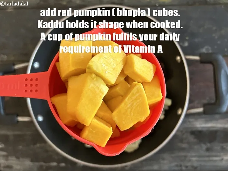 Step 14 – Add&nbsp;<meta charset="UTF-8" />1 cup&nbsp;<a href="glossary-red-pumpkin-cubes-1530i">red pumpkin (bhopla / kaddu) cubes</a>.&nbsp;Red pumpkins are dense and hold …