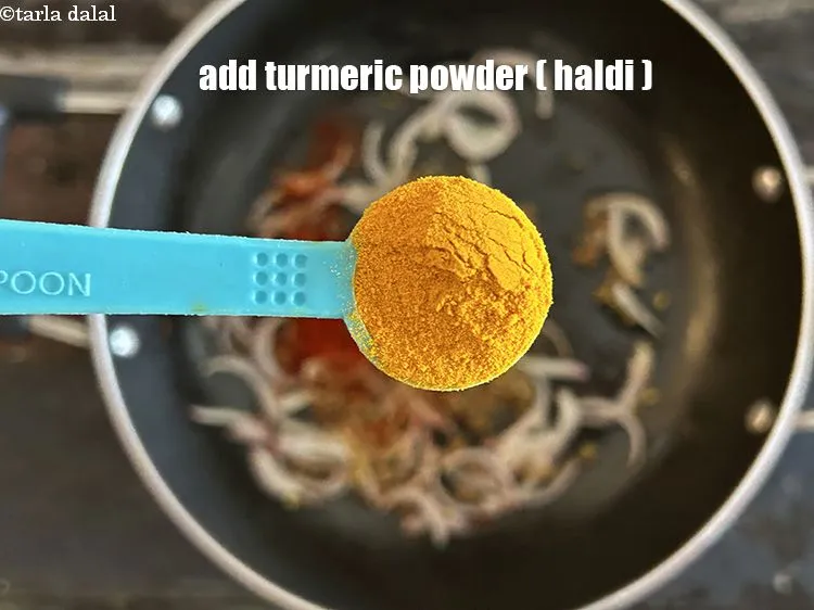 Step 15 – Add&nbsp;<meta charset="UTF-8" />1/2 tsp&nbsp;<a href="glossary-turmeric-powder-haldi-645i">turmeric powder (haldi)</a>.