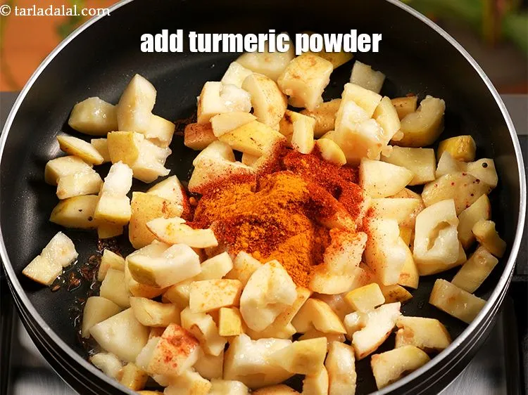 Step 14 – Add &frac14; tsp&nbsp;<a href="https://www.tarladalal.com/glossary-turmeric-powder-haldi-645i">turmeric powder (haldi)</a>.&nbsp;
